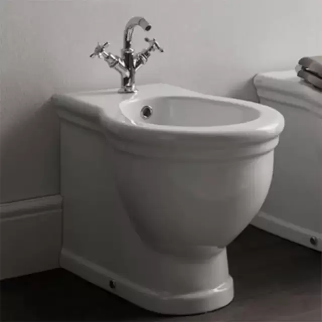 Globo Paestum Биде напольное пристенное 57х38см с 3 отв. под смеситель, с комплектом креплений, цвет: белый